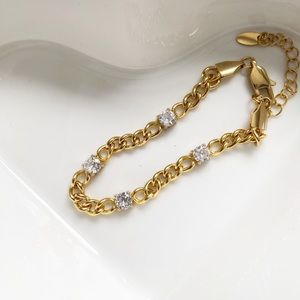 Diamond station cuban bracelet. 18k plated, cz